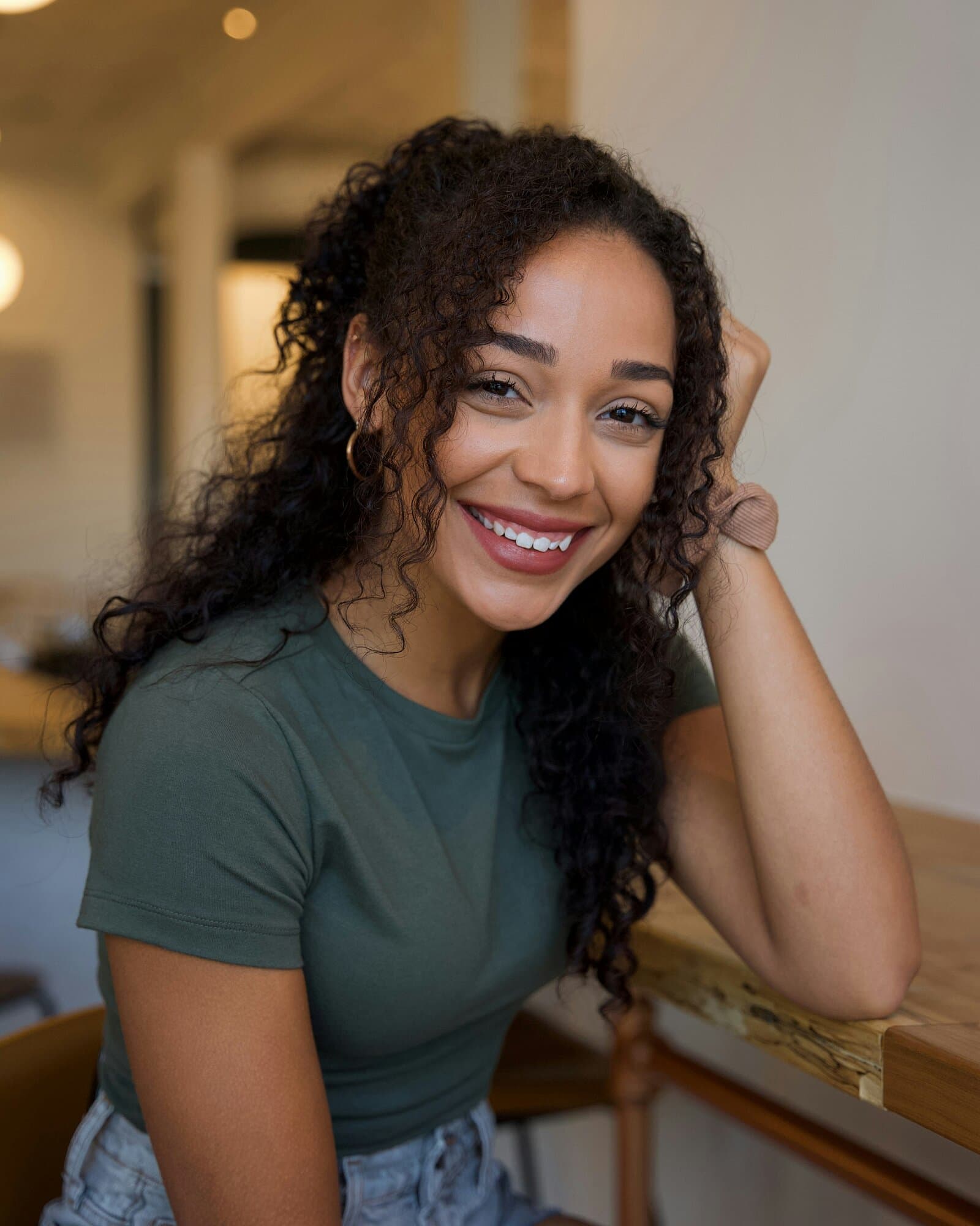 A smiling hair and beauty professional